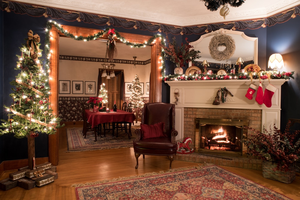 The interior of a historic estate decorated in the Victorian Era for christmas - much like the Hardman Farm State Historic Site