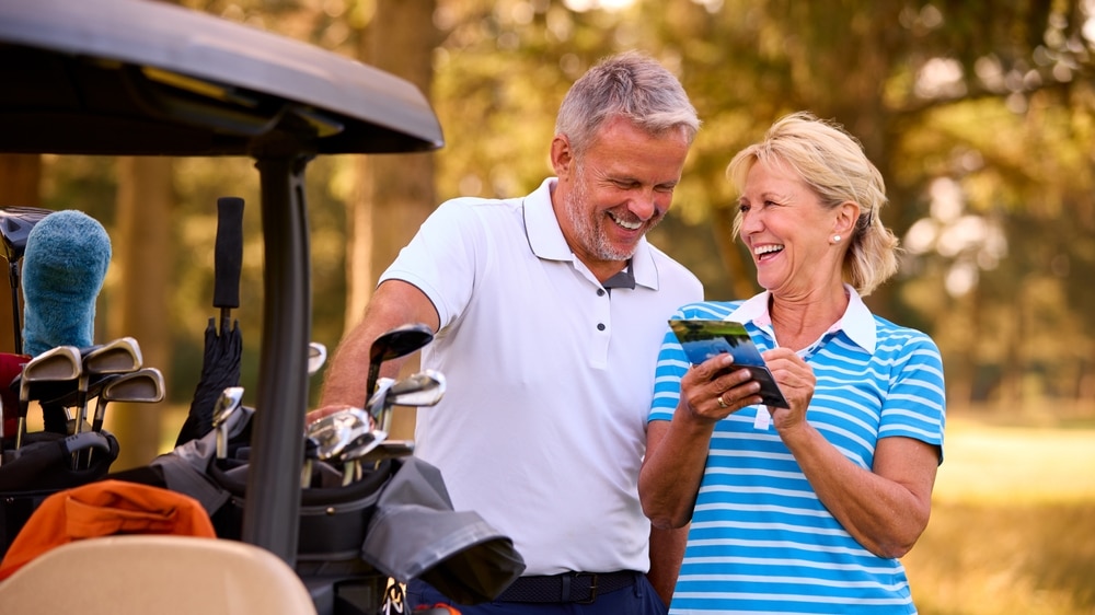 senior couple golfing at the best golf courses in North Georgia