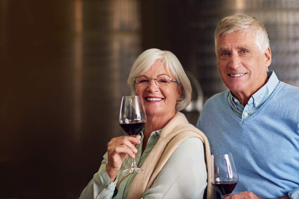 Older couple enjoying an afternoon at wineries, one of the best things to do in Clarkesville, Georgia this winter