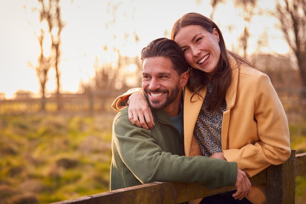 A couple enjoying a walk outside during the best romantic getaways in Georgia