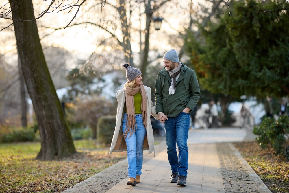 Couple enjoying a winter walk - one of the best things to do in North Georgia For Couples