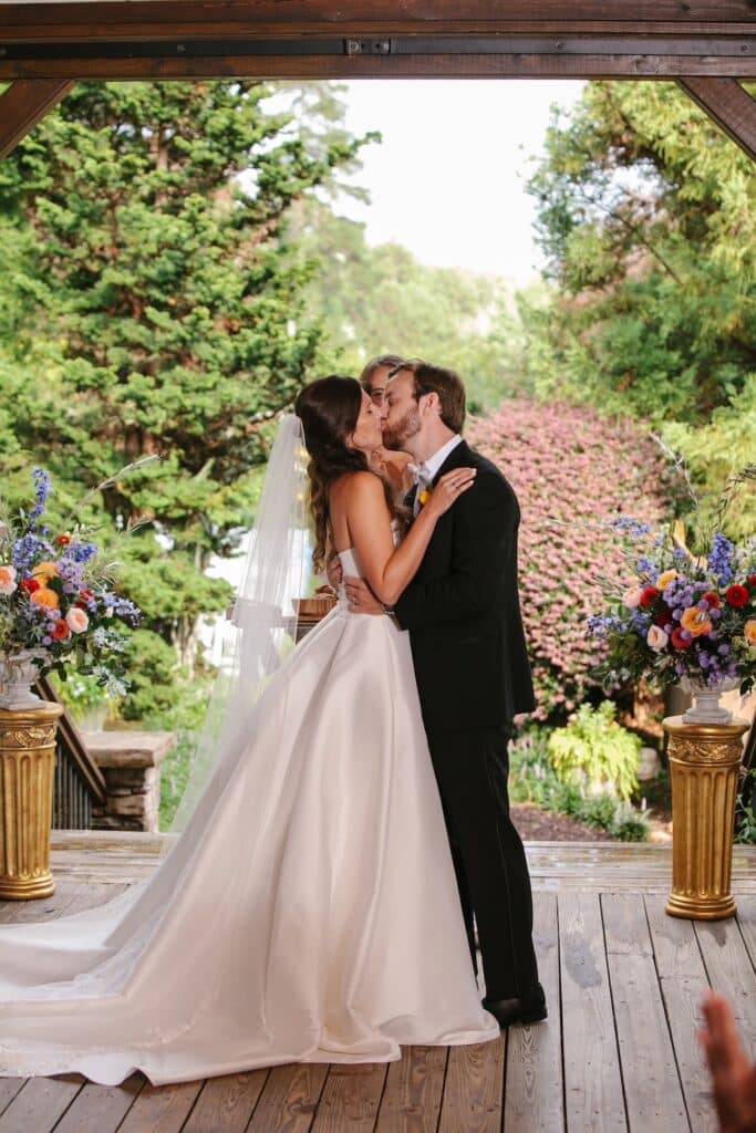 Couple getting married in the gardens at one of the best North GEorgia wedding venues